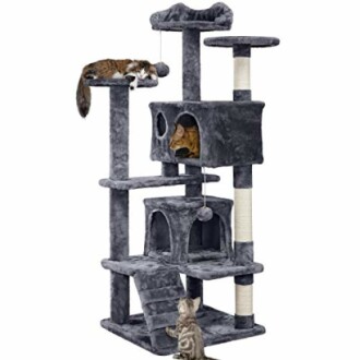 Cats playing on a multi-level gray cat tree tower