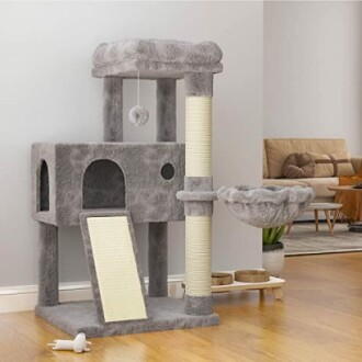 Gray cat tree condo with scratching posts and hammock.